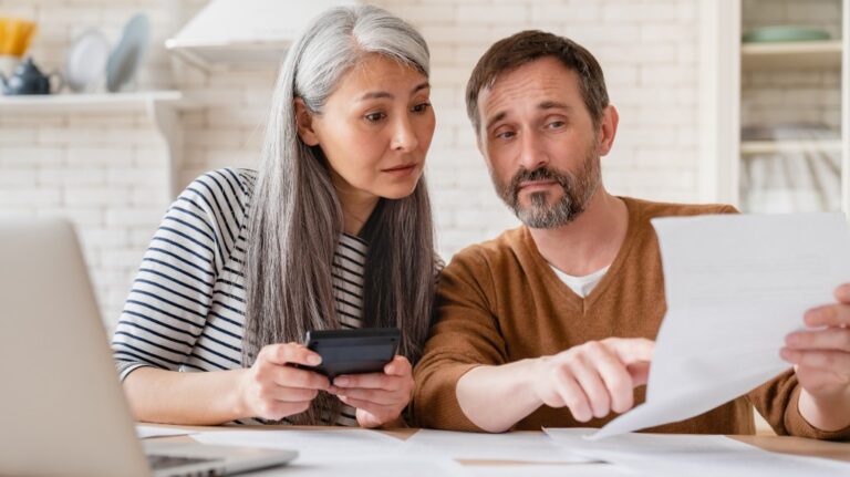Older couple looking at paperwork