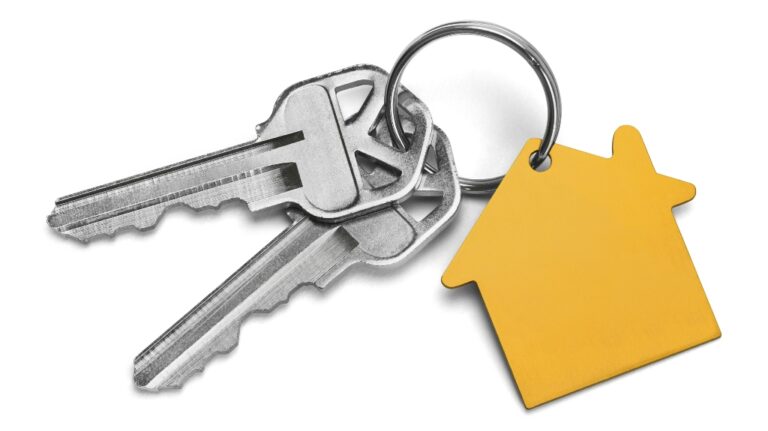 keys attached to small house
