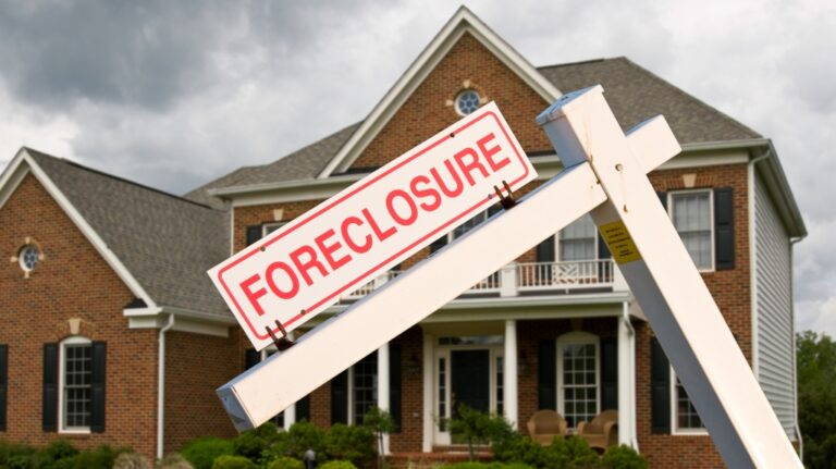 foreclosure sign in front